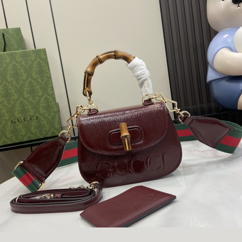 G*u*i top handle bags